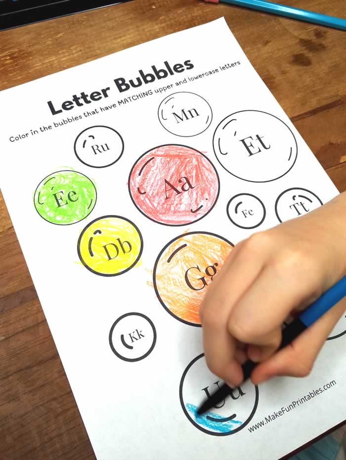Colorful letter bubble matching game to help kids recognize and sort alphabet letters